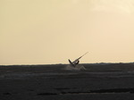 SX10535 Windsurfer jumping from wave at Newton Point, Porthcawl.jpg